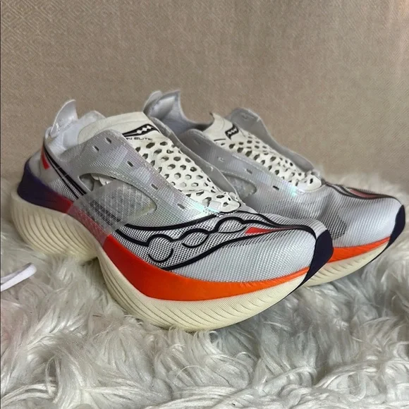 Saucony White and Orange Athletic Shoes with PWRRUN Cushioning - Picture 1 of 8